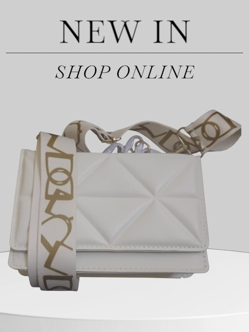 White Quilted Crossbody Bag with Decorative Strap